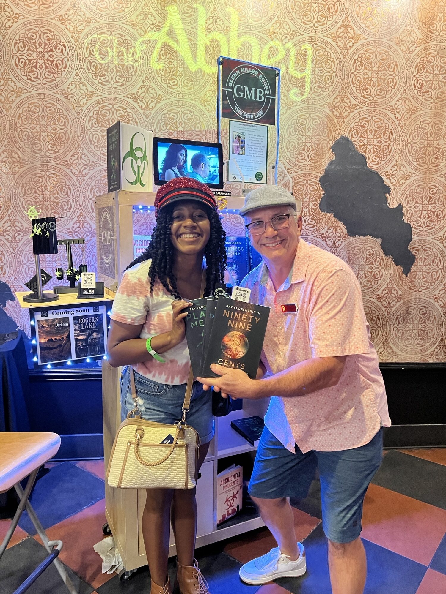 Glenn Miller with reader at a book event display